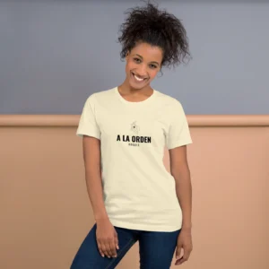 Female model wearing a la orden tee, white ink design