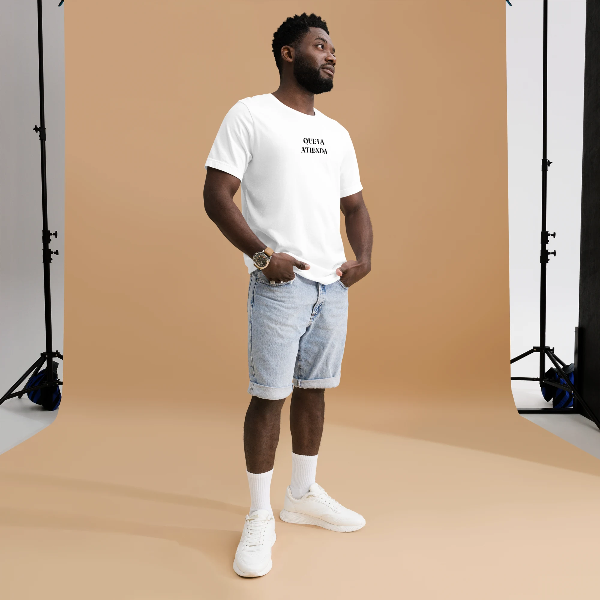 Man wearing QUE LA ATIENDA tee, second half of the matching refrán set
